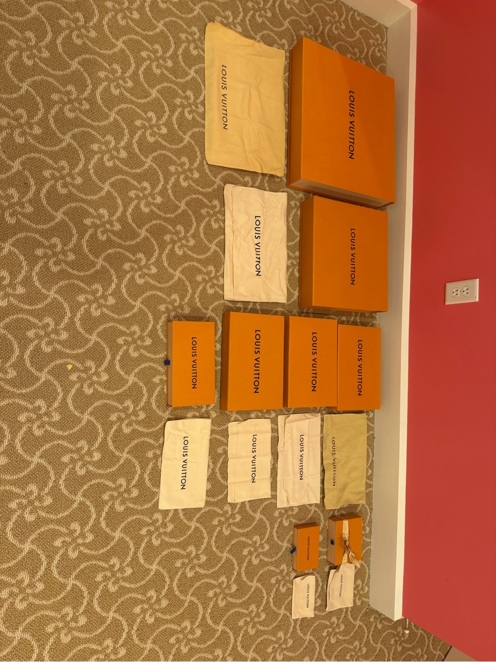 Various Sizes of Louis Vuitton gift boxes and dust bags.